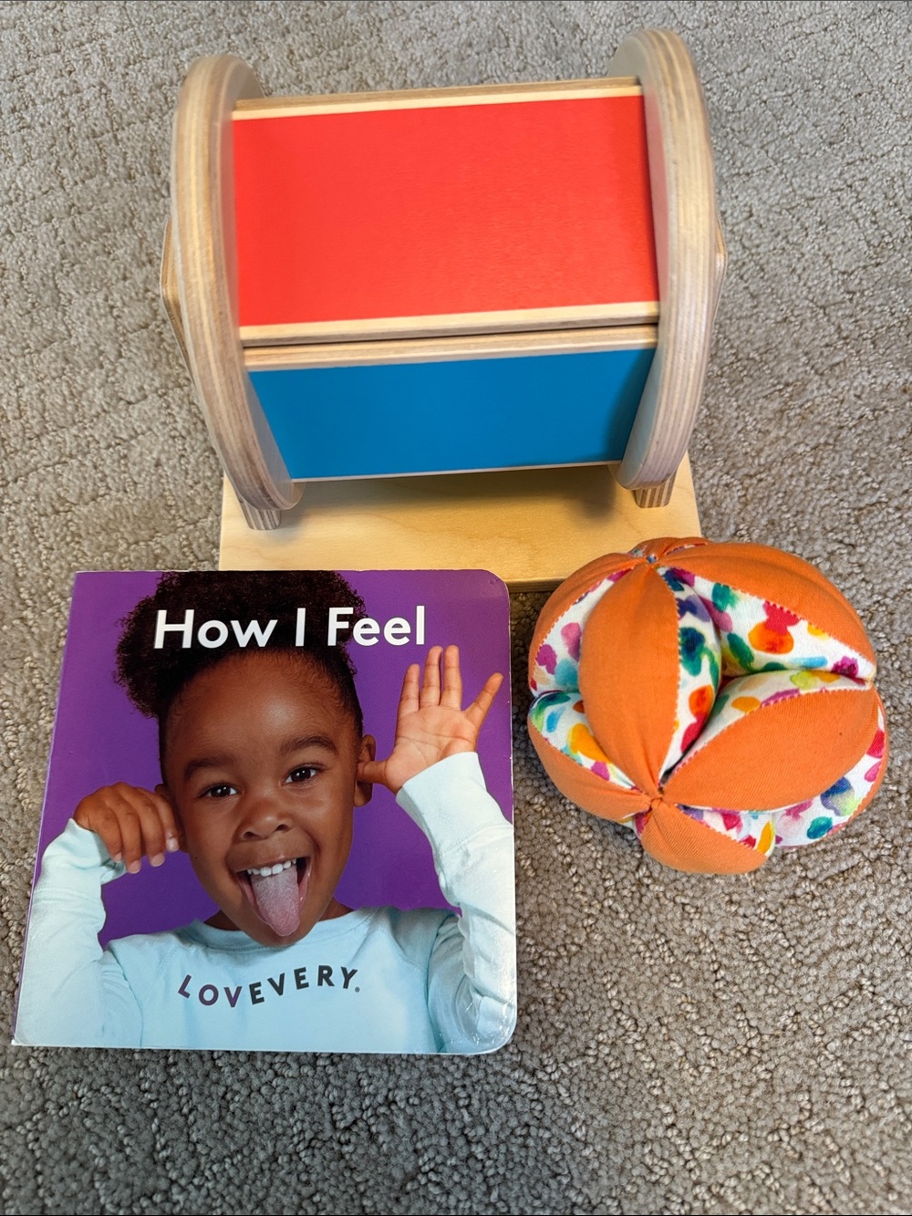 Lovevery spinning wheel, fabric ball & book bundle